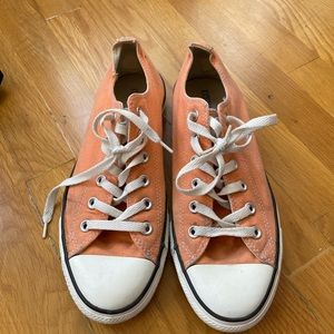 Orange Converse low tops